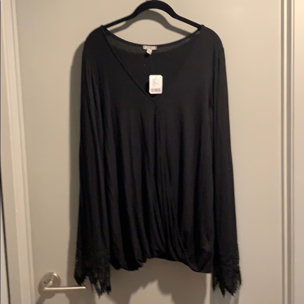 Black top with beautiful lace on sleeves!! NWT